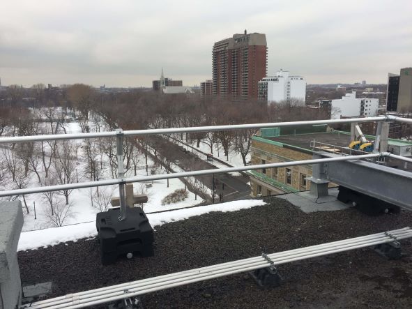 Fall protection non penetrating guardrail in the snow during winter