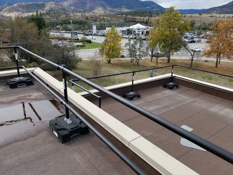 Rooftop safety railing on green roof in Penticton, British-Columbia